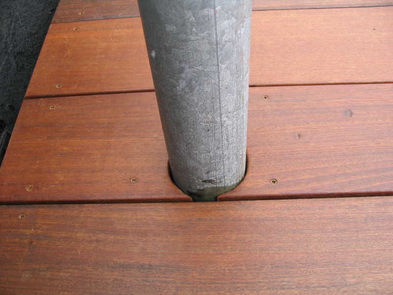 IPE DECK SCRIBED AROUND PIPE